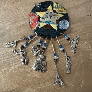 Charming Travel Brooch with Iconic Charms